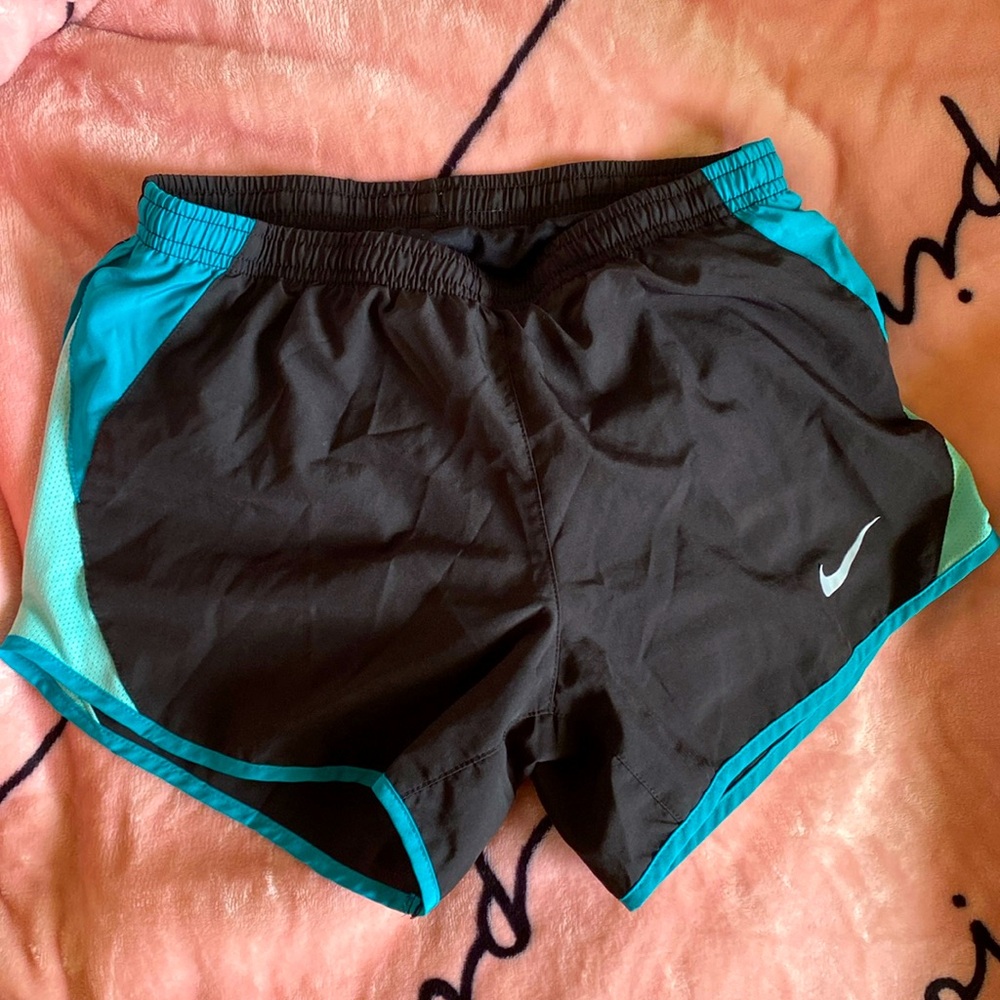Black and teal Nike running shorts